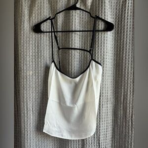 Sheer cream tank with black straps, open back from Free People